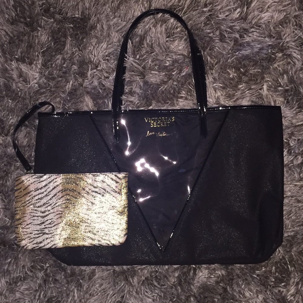 Victoria Secret tote with makeup bag.